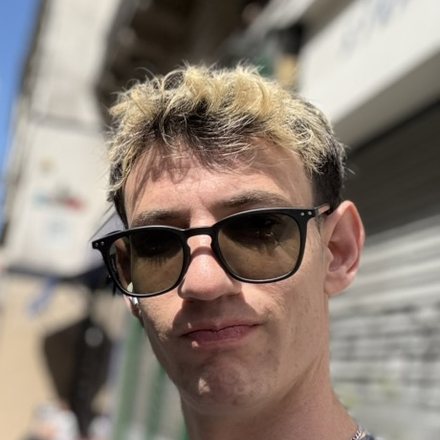 Assaf Shalin on a Paris street in sunglasses